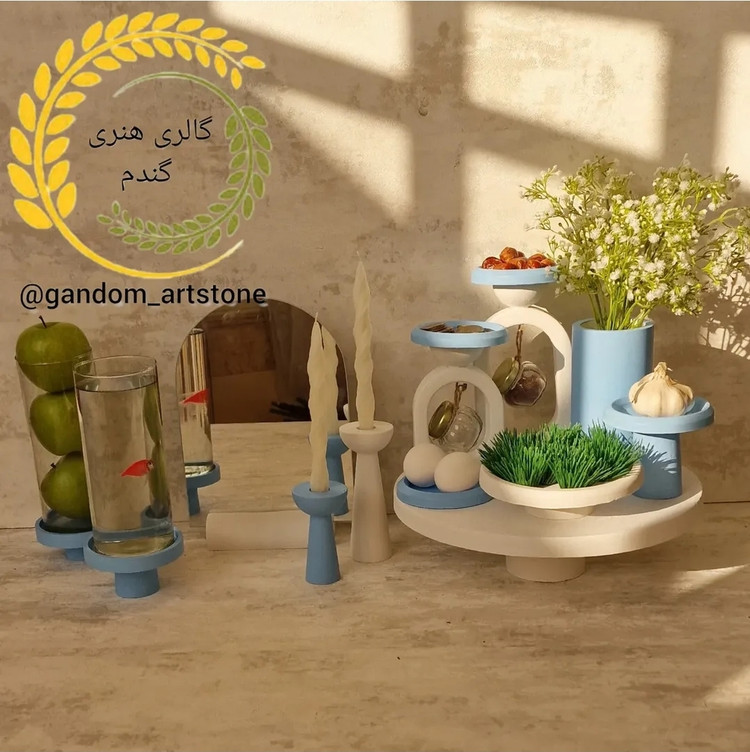 هفت سین 15 تیکه بتنی بهمراه دوتا تنگ شیشه ای ،دوتا شمع استوانه ، دوتا بطری آویز، گندم خشک و تخم مرغ رنگی
