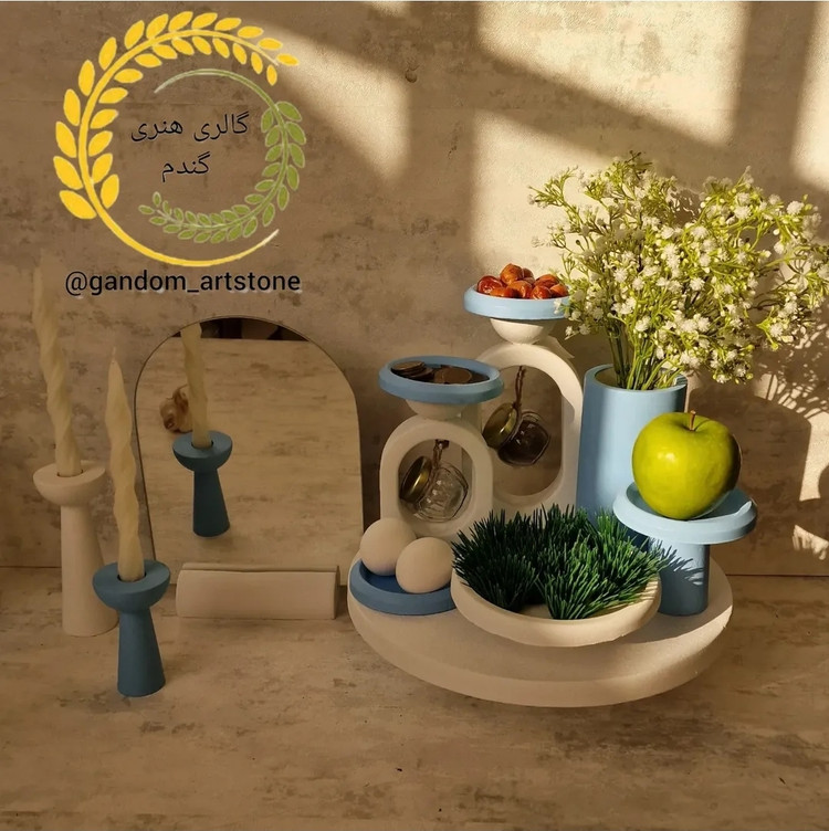 هفت سین 15 تیکه بتنی بهمراه دوتا تنگ شیشه ای ،دوتا شمع استوانه ، دوتا بطری آویز، گندم خشک و تخم مرغ رنگی